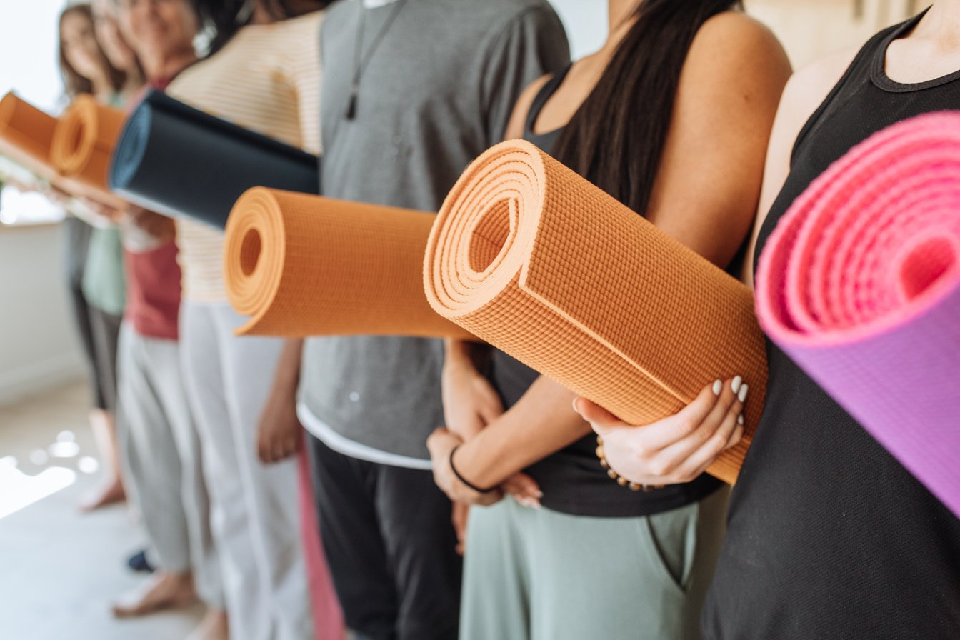 Group with yoga mats